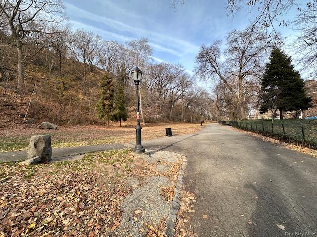225 Bennett Avenue, Unit 2R Manhattan, NY 10040 - Photo 23 of 25 a view of a yard with wooden fence