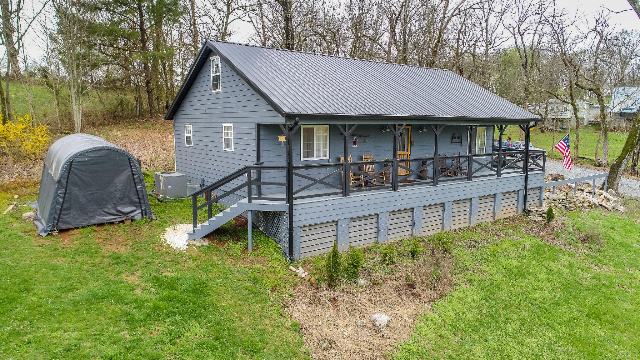 2828 Henry Gower Road Pleasant View, TN 37146 - Photo 5 of 37 a view of house with a yard and sitting area