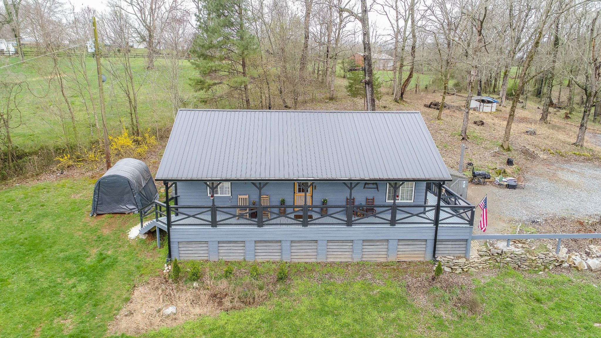 2828 Henry Gower Road Pleasant View, TN 37146 - Photo 6 of 37 a view of house with backyard and outdoor seating