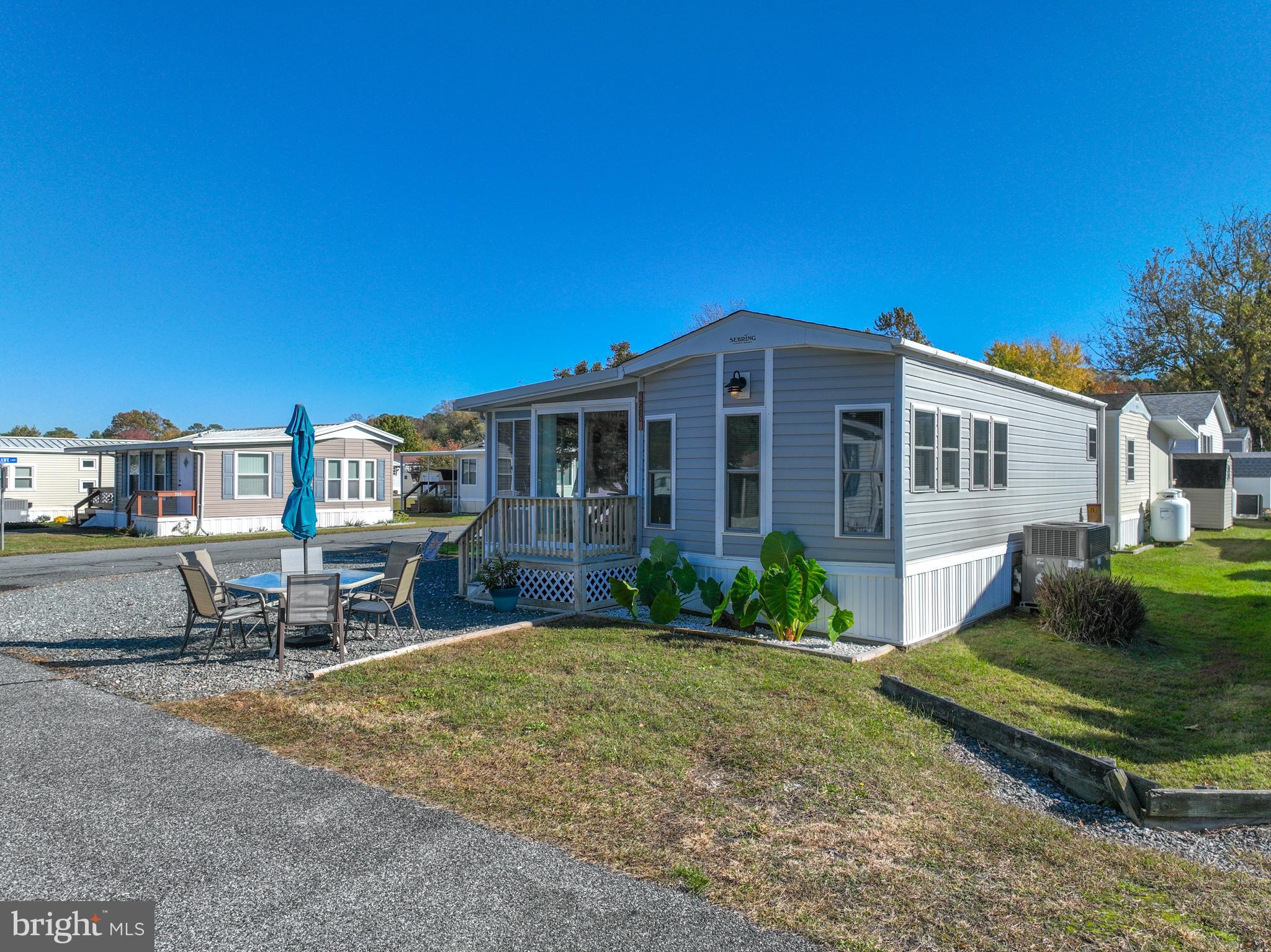 380 Seahawk Lane Berlin, MD 21811 - Photo 3 of 72 a front view of a house with a yard