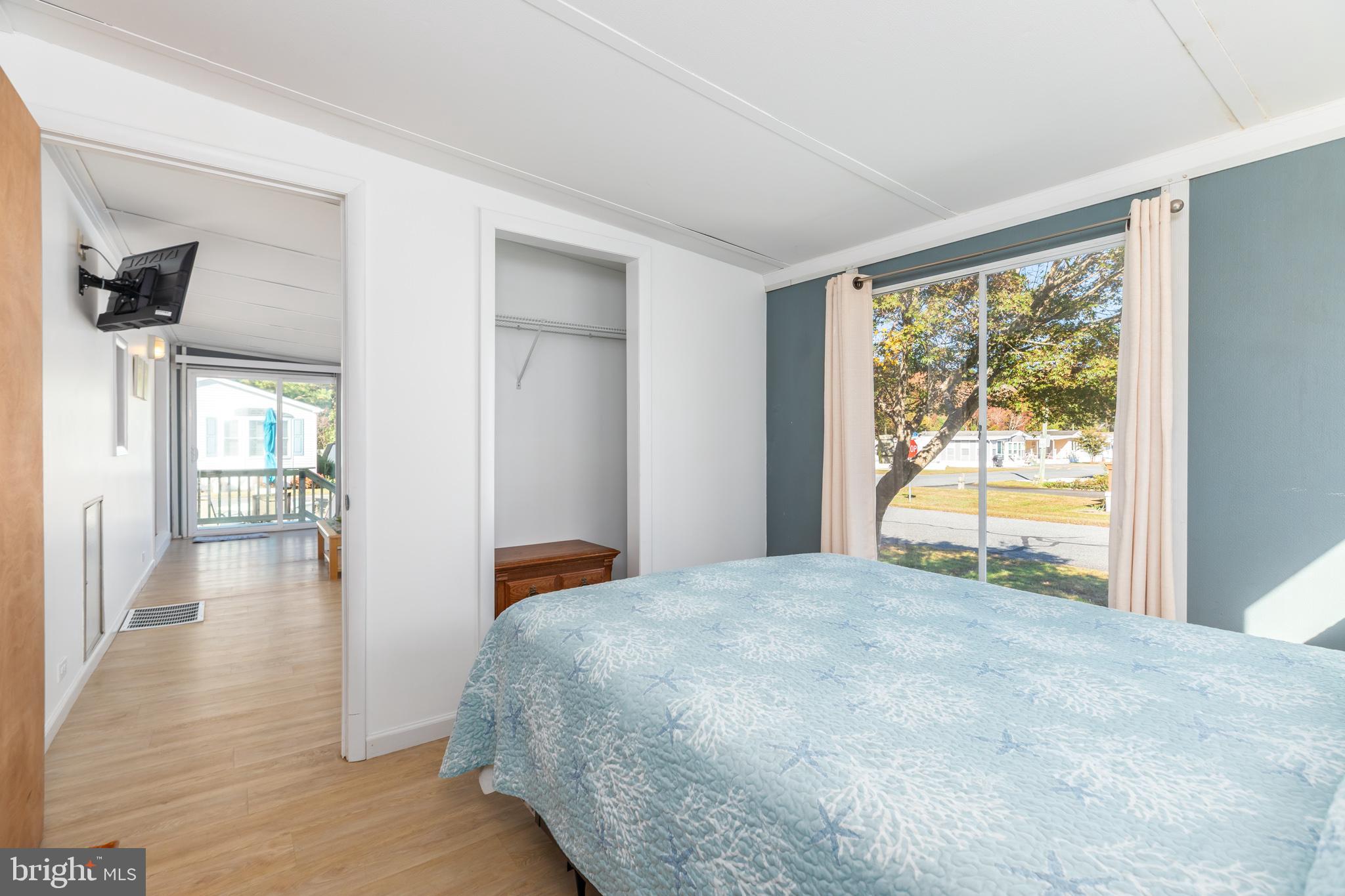 380 Seahawk Lane Berlin, MD 21811 - Photo 34 of 72 a bedroom with a bed and a window