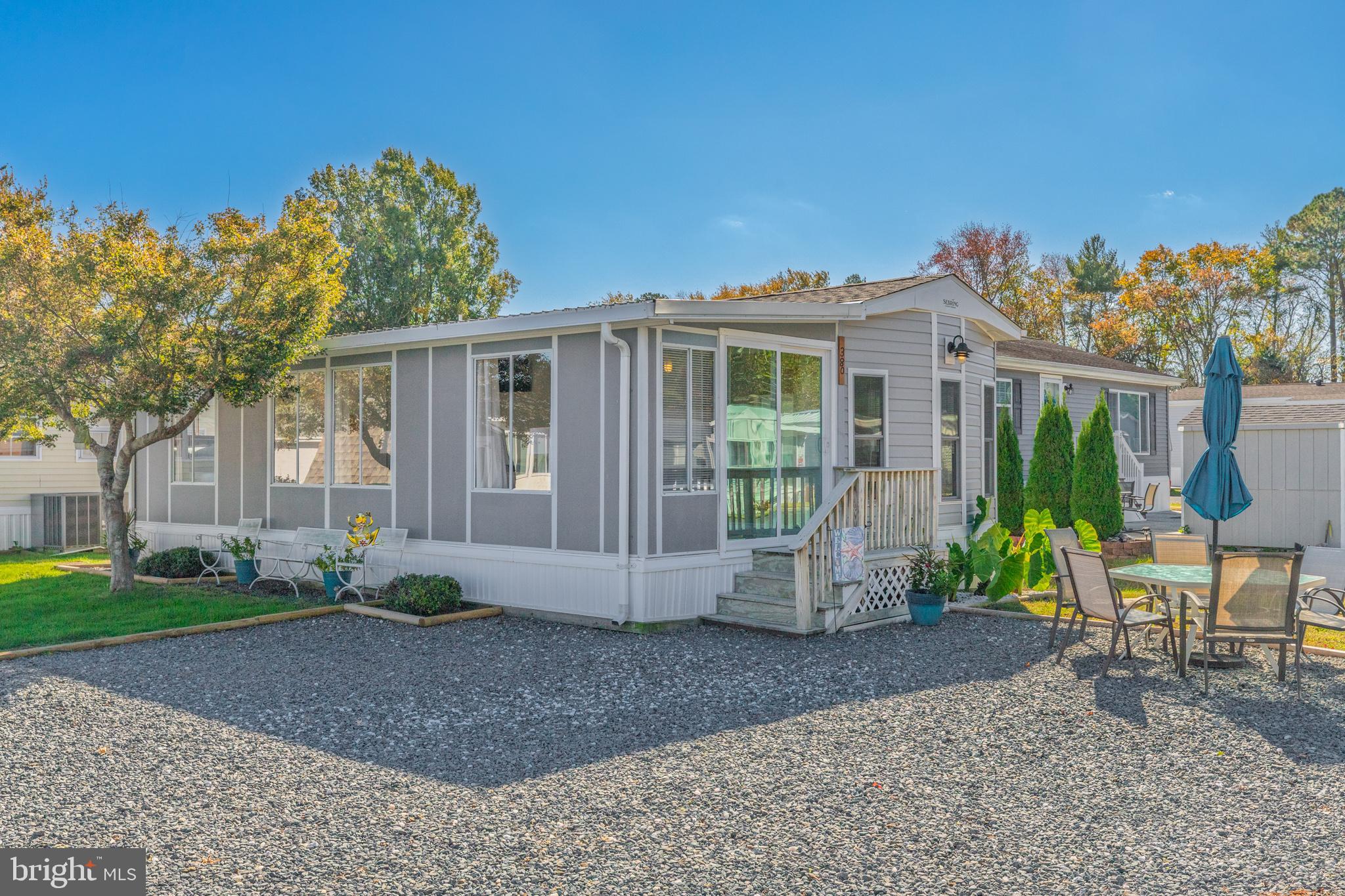 380 Seahawk Lane Berlin, MD 21811 - Photo 38 of 72 a view of a house with backyard and garden