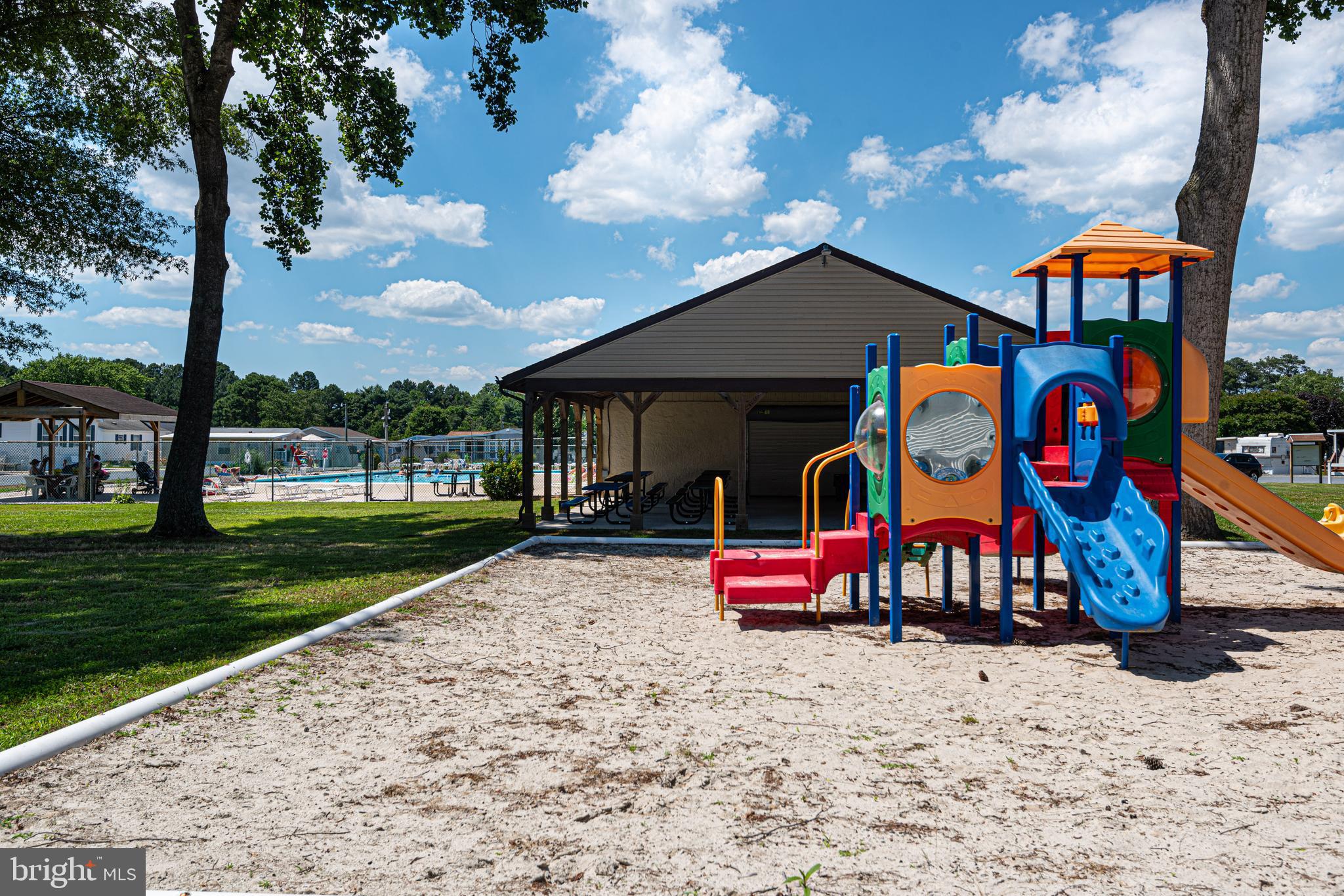 380 Seahawk Lane Berlin, MD 21811 - Photo 43 of 72 a front view of a house with garden and entertaining space