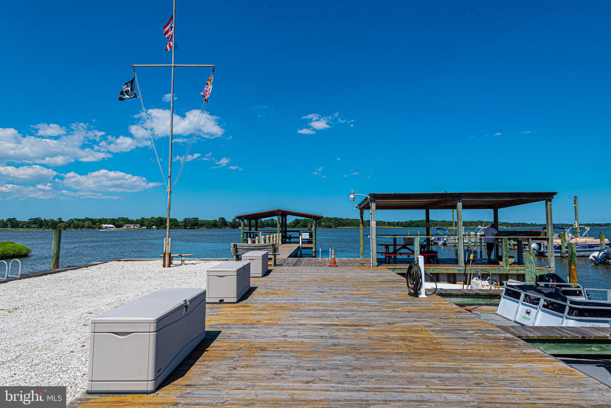 380 Seahawk Lane Berlin, MD 21811 - Photo 47 of 72 a view of a patio with swimming pool