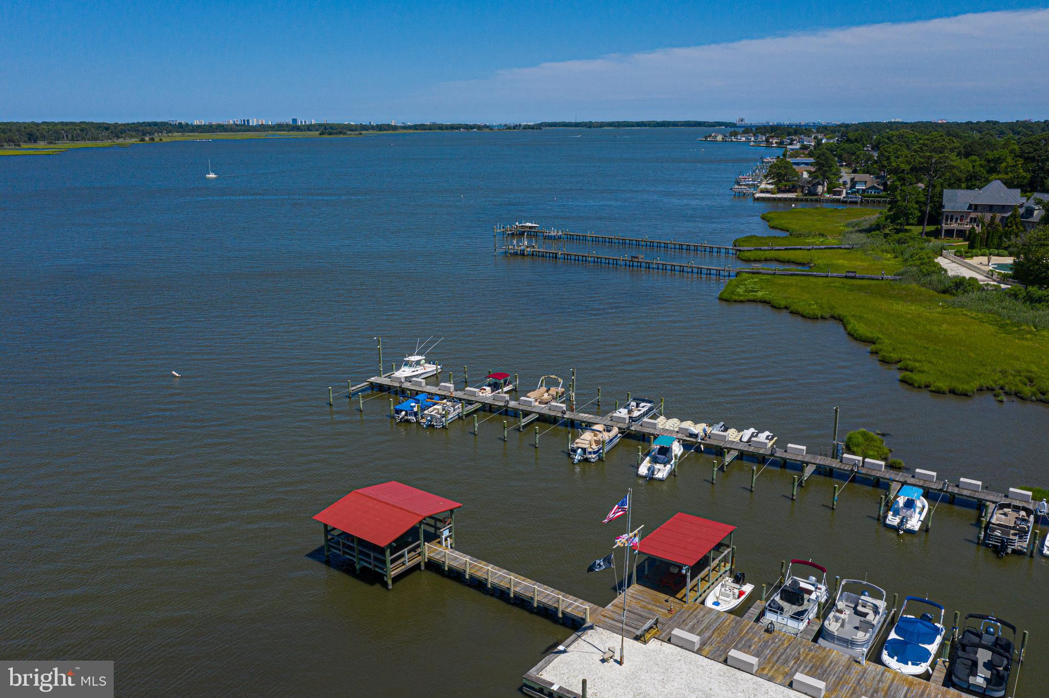 380 Seahawk Lane Berlin, MD 21811 - Photo 59 of 72 an aerial view of a house with a floor to ceiling window and yard