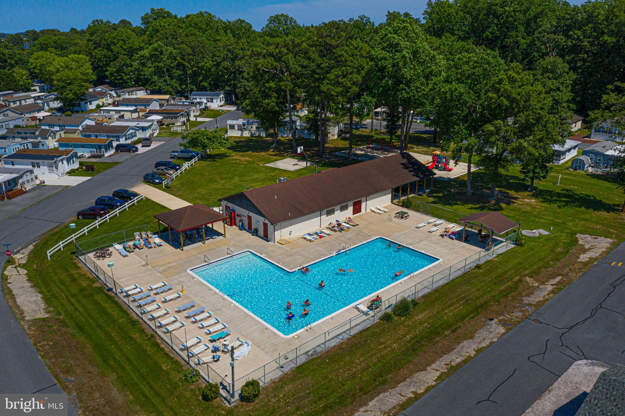 380 Seahawk Lane Berlin, MD 21811 - Photo 67 of 72 an aerial view of a tennis ground and a yard view