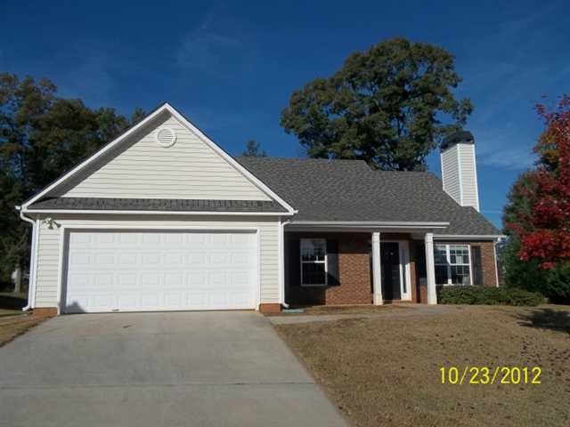 706 Thompson Ridge Drive, Unit 2/89 Monroe, GA 30655 - Photo 1 of 1 a view of outdoor space yard and front view of a house
