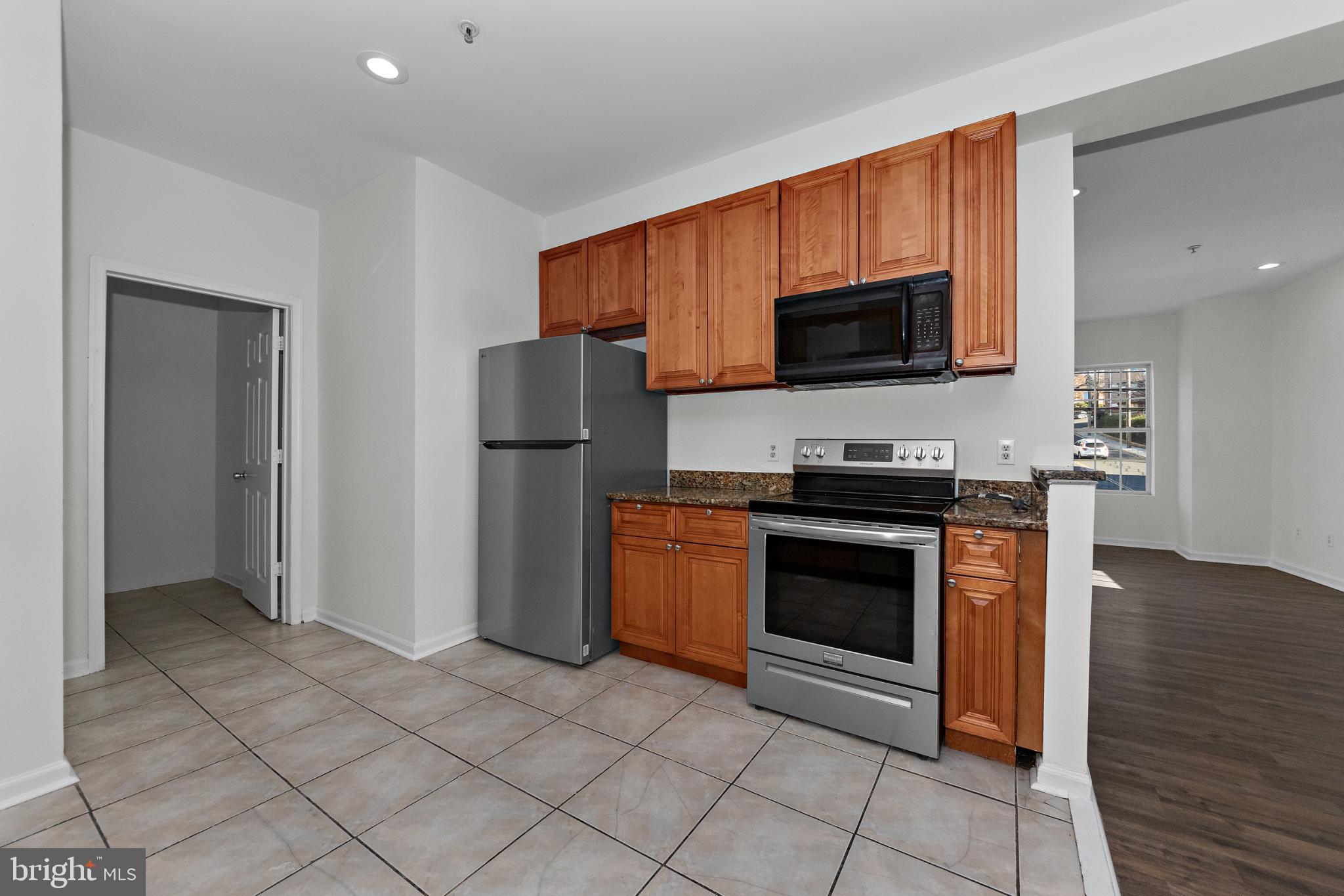 2409 Bryan Place Southeast Washington, DC 20020 - Photo 23 of 43 Modern kitchen with sleek appliances.