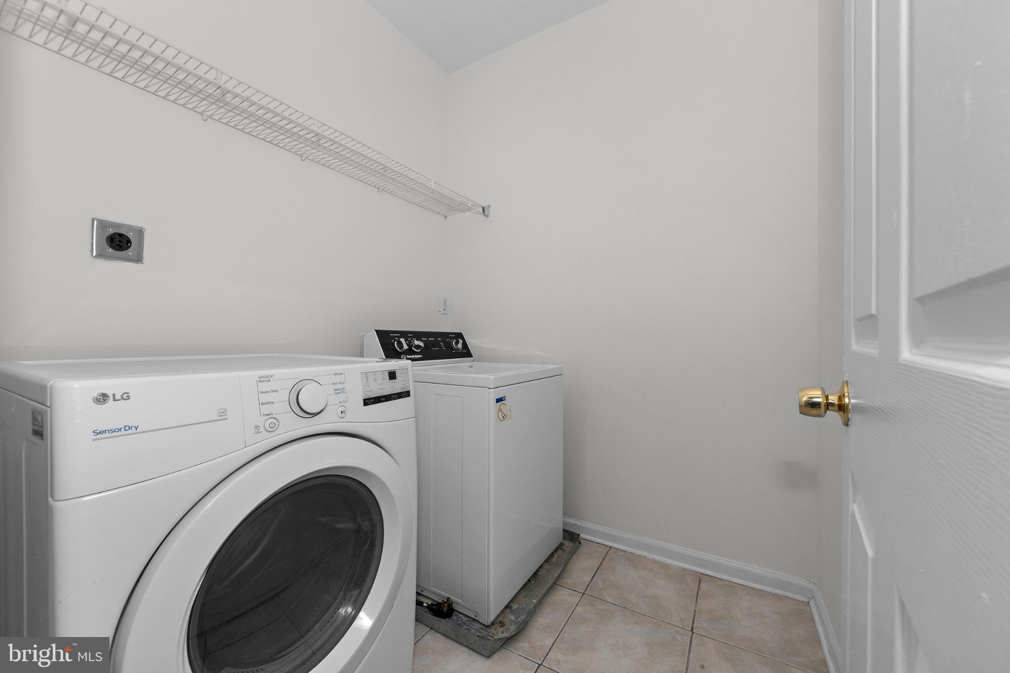 2409 Bryan Place Southeast Washington, DC 20020 - Photo 25 of 43 Bright and functional laundry space.