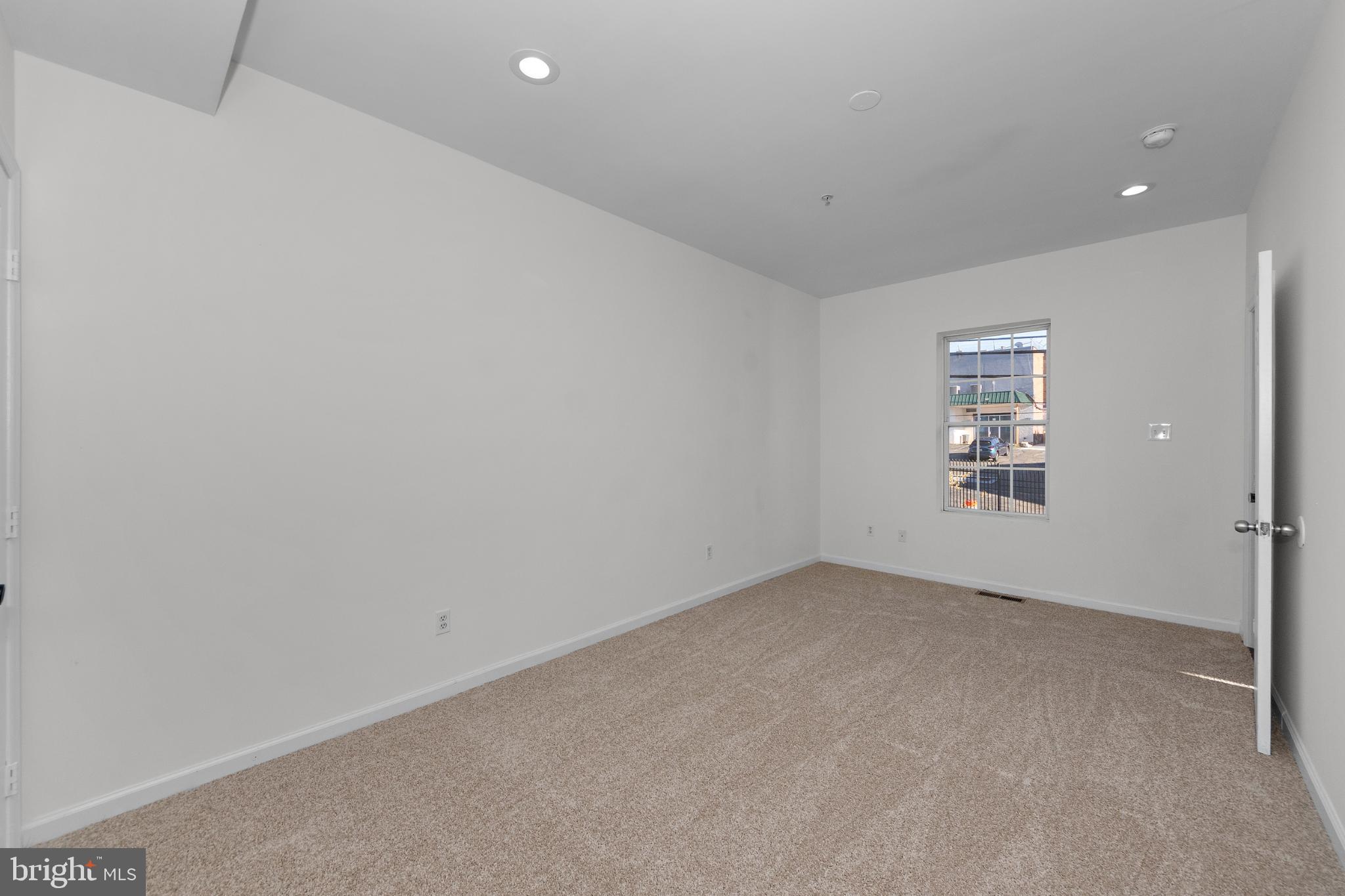 2409 Bryan Place Southeast Washington, DC 20020 - Photo 27 of 43 Spacious room with natural light and potential.