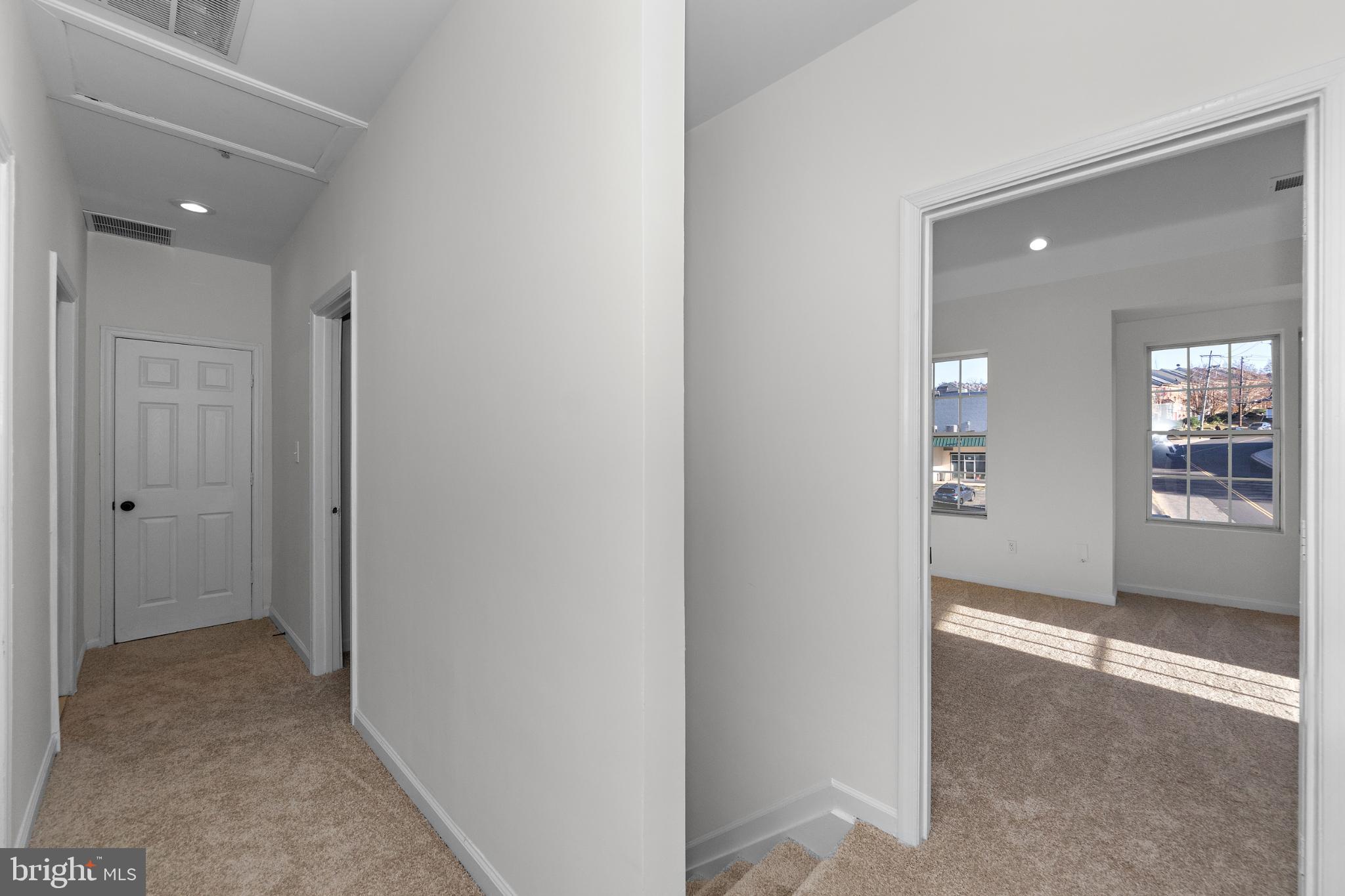 2409 Bryan Place Southeast Washington, DC 20020 - Photo 28 of 43 Bright and inviting hallway with natural light.