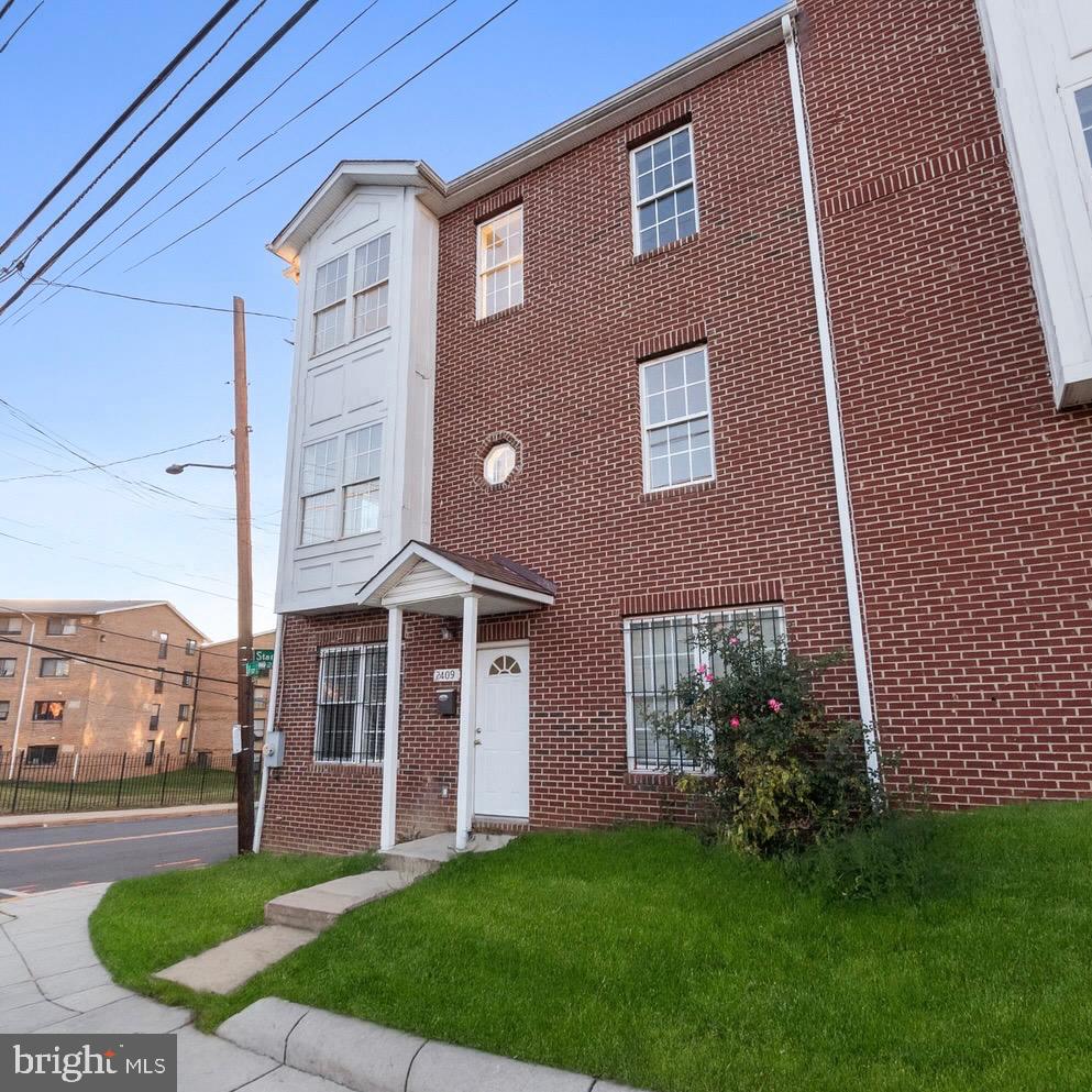 2409 Bryan Place Southeast Washington, DC 20020 - Photo 3 of 43 Charming brick facade with inviting entrance.