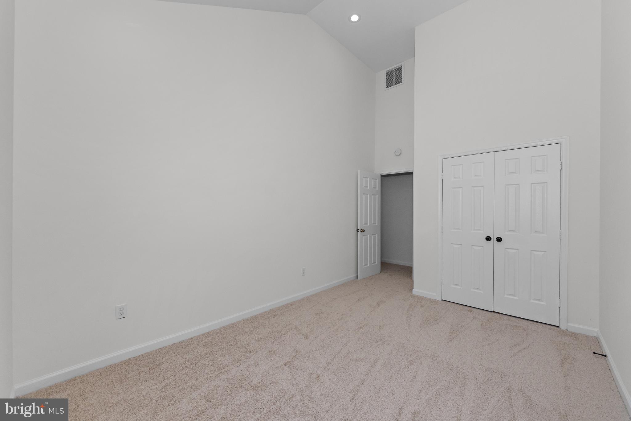2409 Bryan Place Southeast Washington, DC 20020 - Photo 37 of 43 Spacious room with vaulted ceilings.