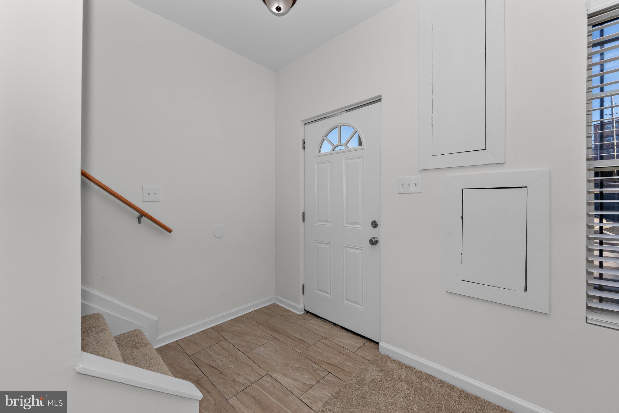 2409 Bryan Place Southeast Washington, DC 20020 - Photo 4 of 43 Welcoming entryway with modern charm.