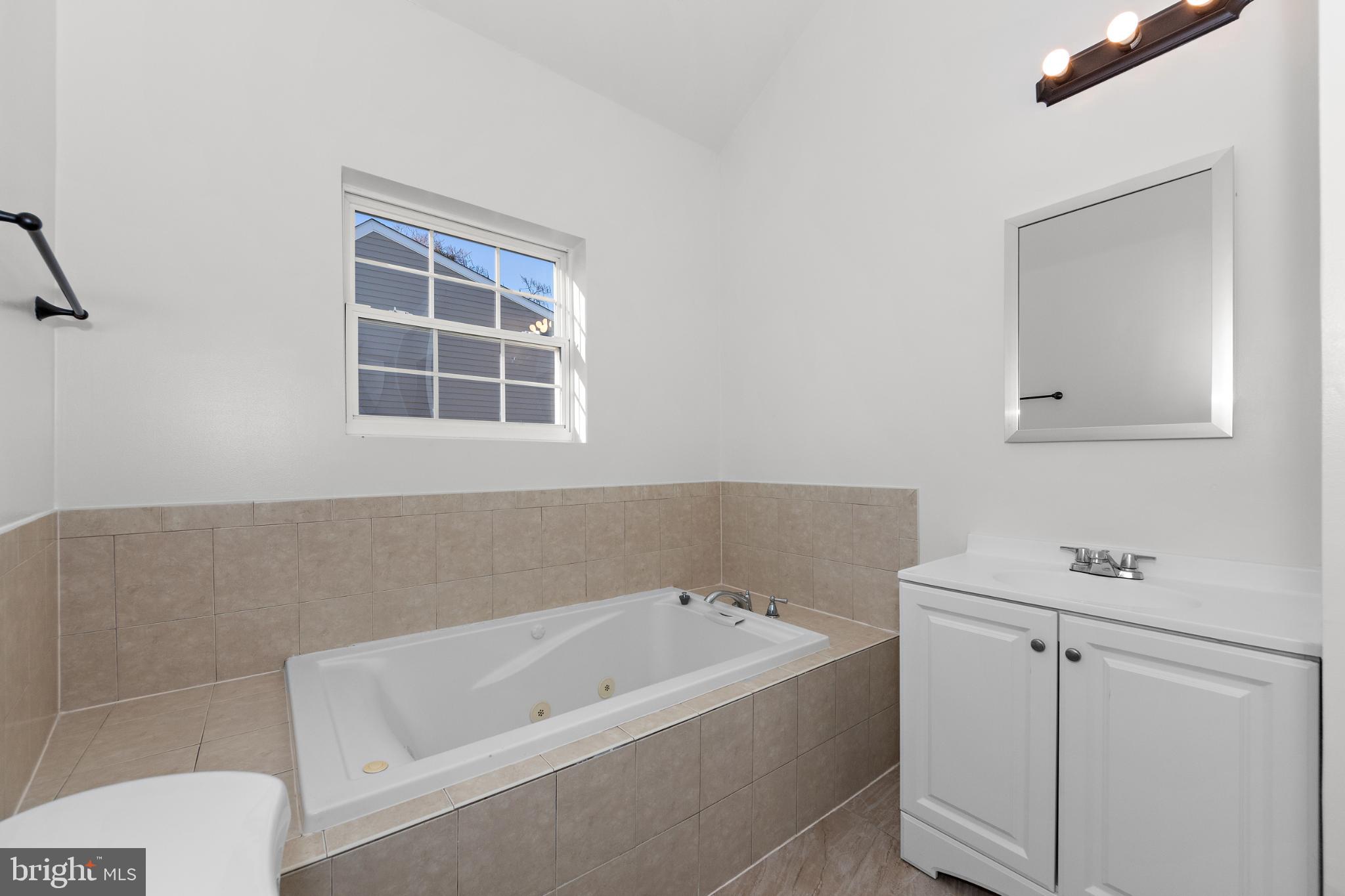 2409 Bryan Place Southeast Washington, DC 20020 - Photo 41 of 43 Serene bathroom with natural light.