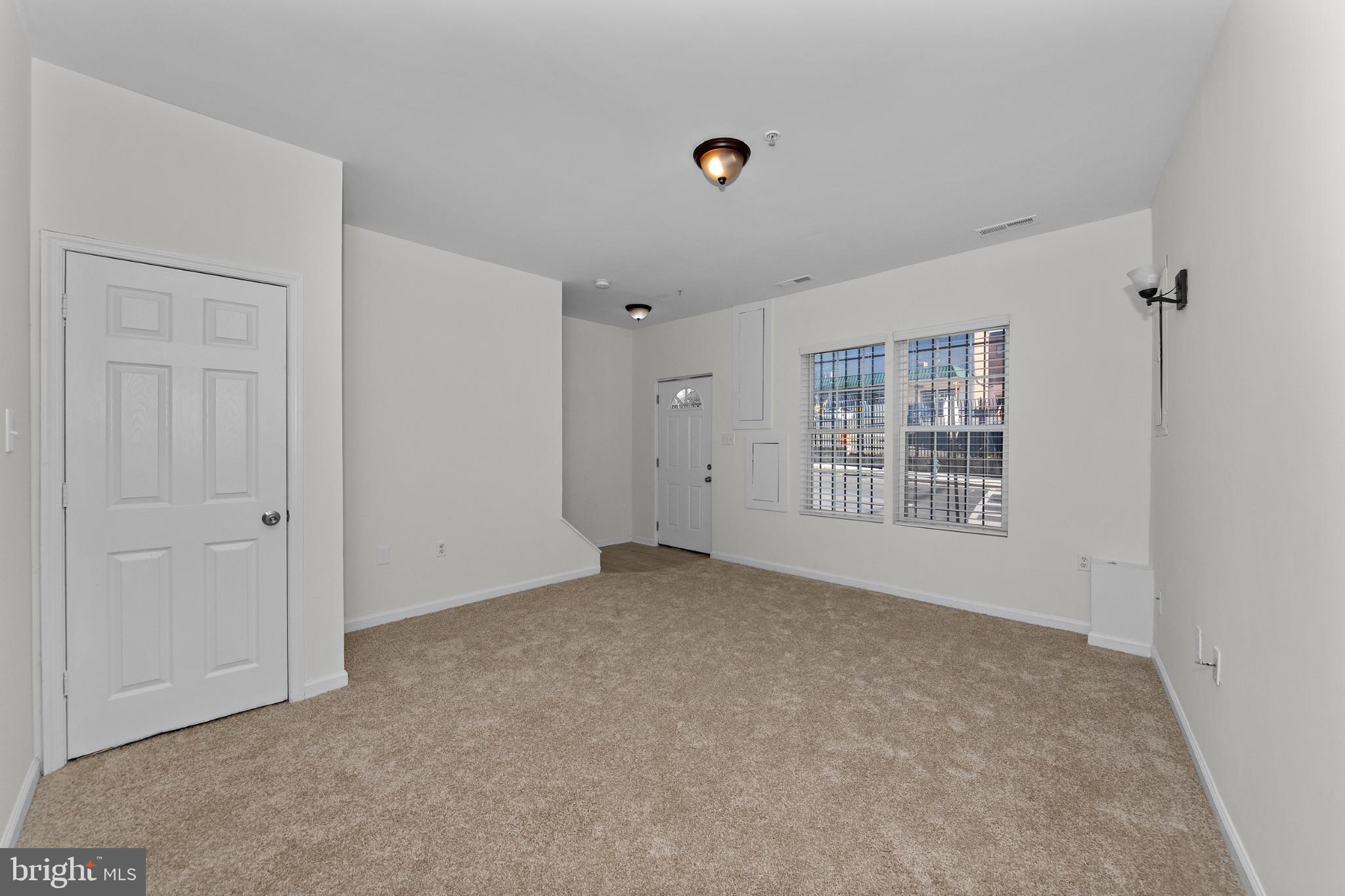 2409 Bryan Place Southeast Washington, DC 20020 - Photo 5 of 43 Spacious, light-filled living area awaits you.