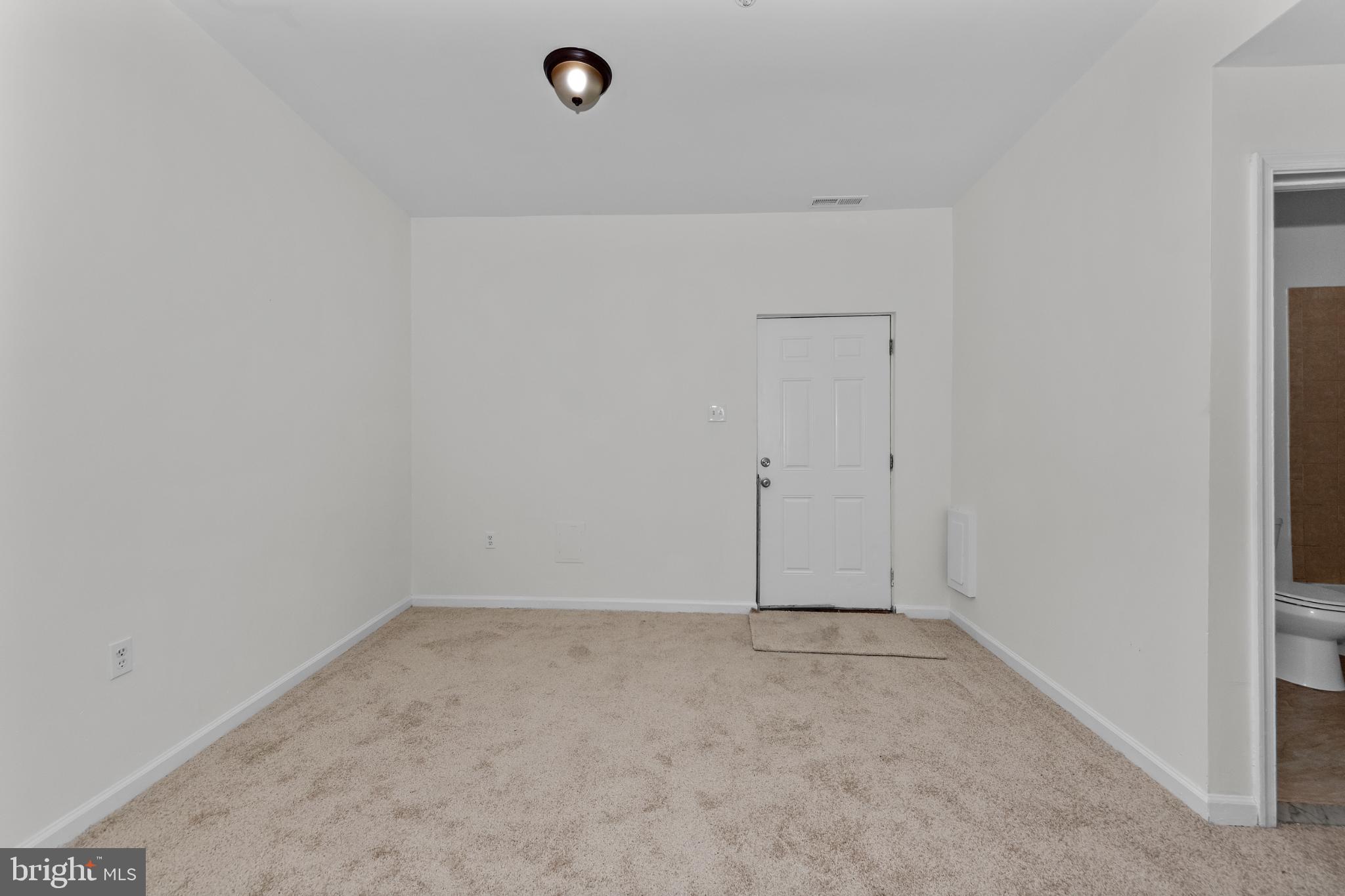 2409 Bryan Place Southeast Washington, DC 20020 - Photo 8 of 43 Spacious room ready for your personal touch.