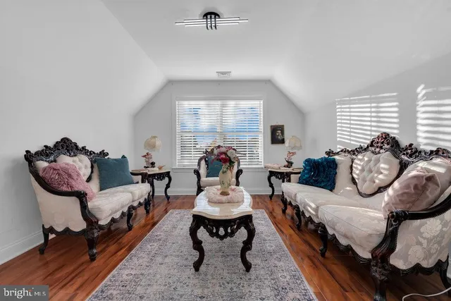 a bathroom with a double vanity sink a mirror and a shower