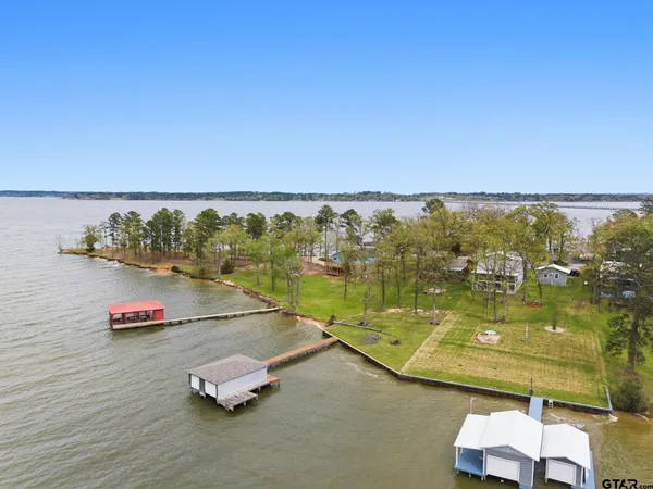 swimming pool with an outdoor seating and yard