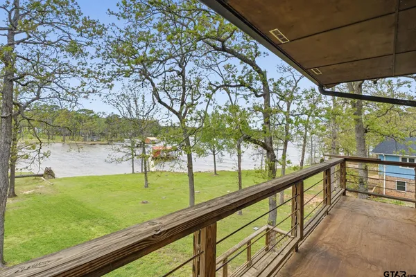 a view of porch with a backyard
