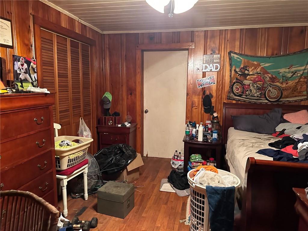 a room with furniture and wooden floor