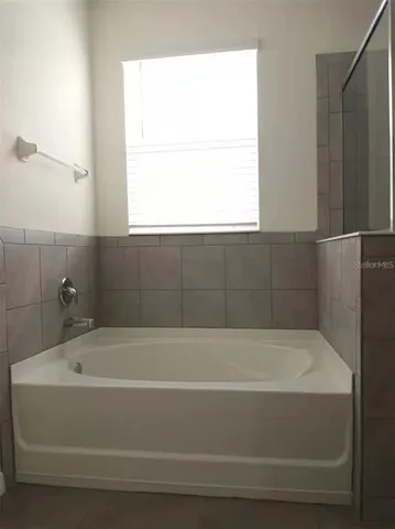 a bathroom with a bathtub