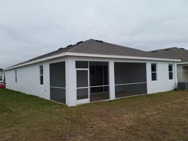 a house with yard in front of it