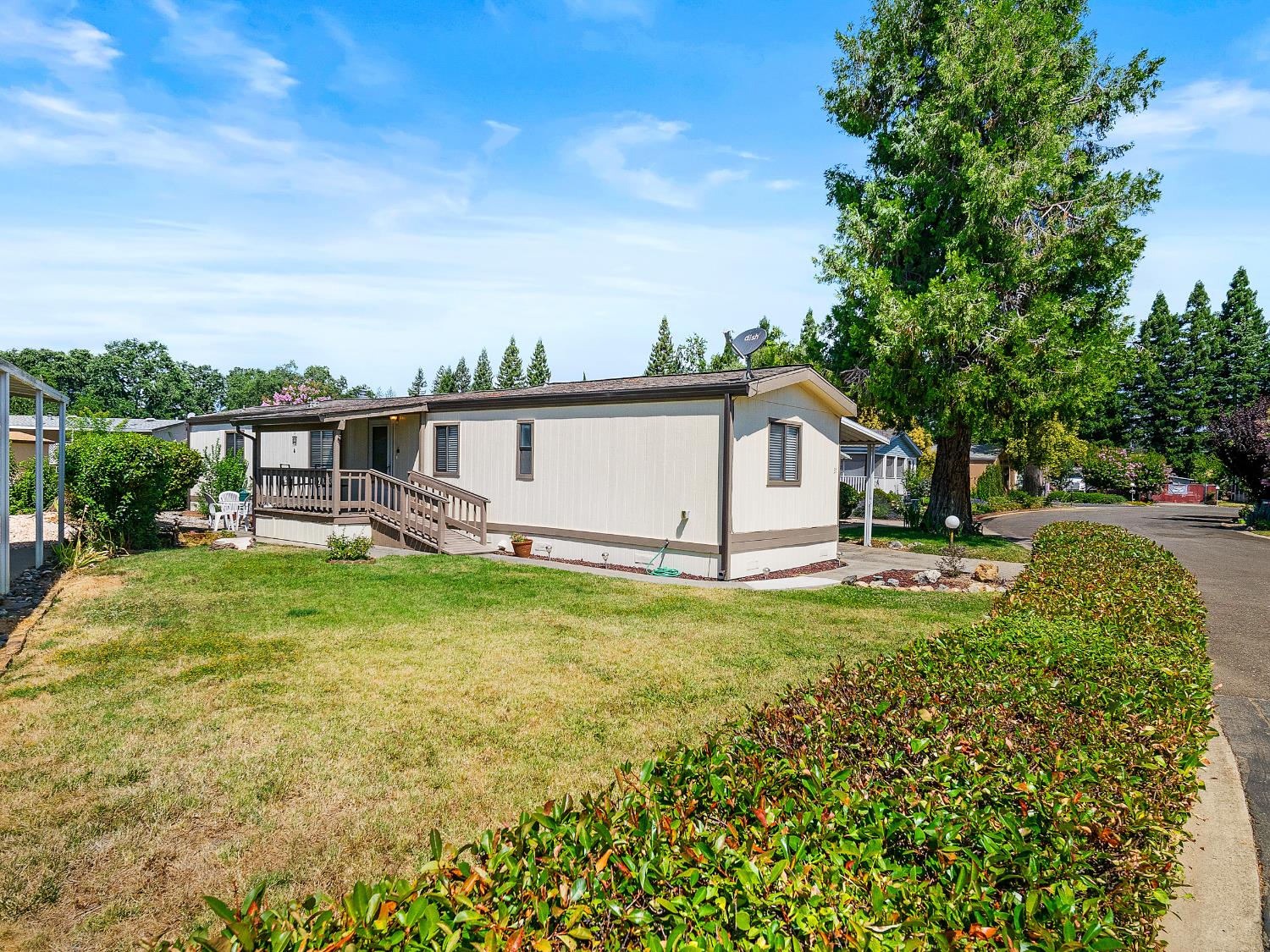 350 Pleasant Valley Road, Unit 37 Diamond Springs, CA 95619 - Photo 1 of 1 Side & Front view of house on a large lot with a big yard for entertaining and gardening. Come make it your own sanctuary!