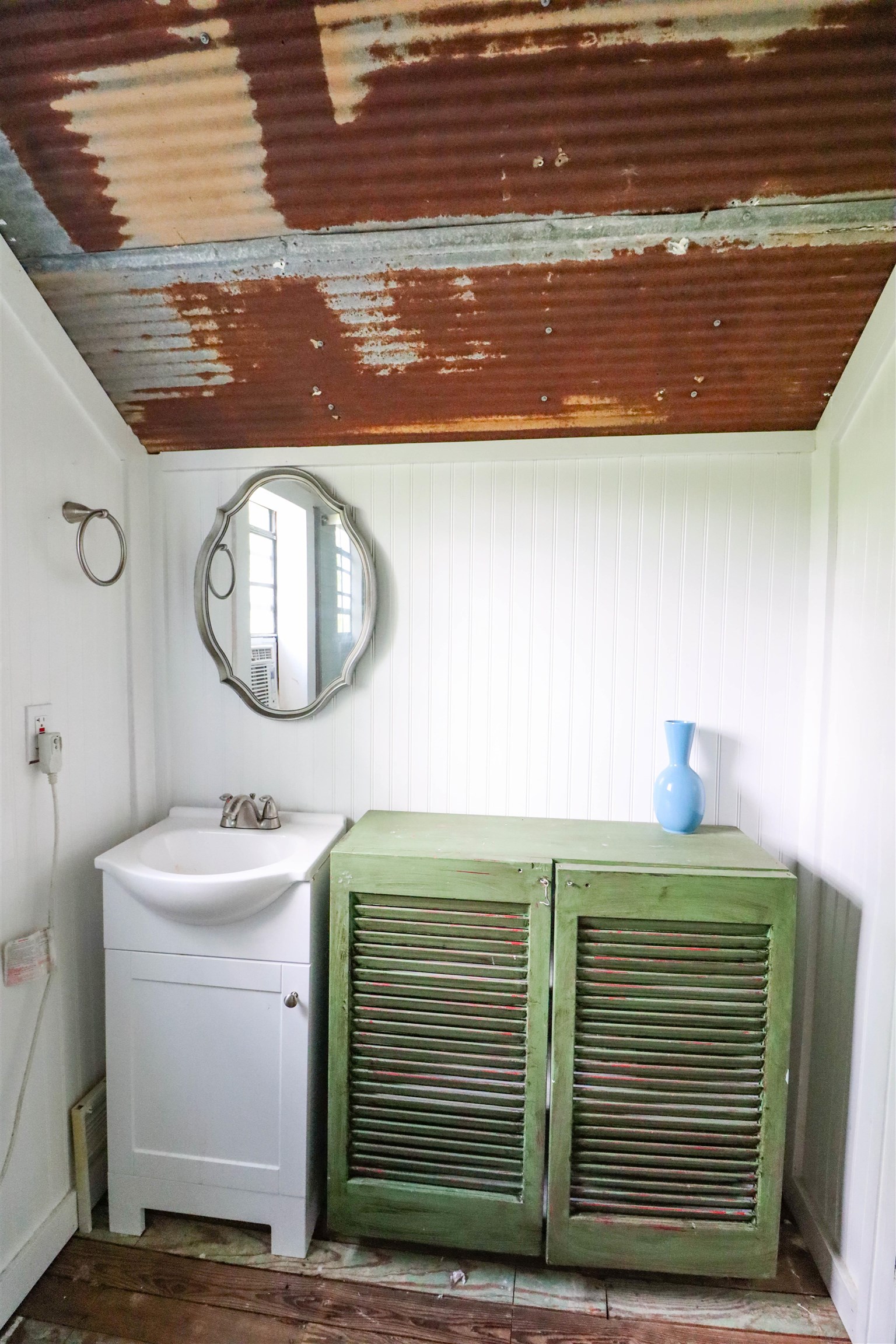 283 Forked Deer Road Ripley, TN 38063 - Photo 19 of 23 a bathroom with a sink a mirror and a vanity