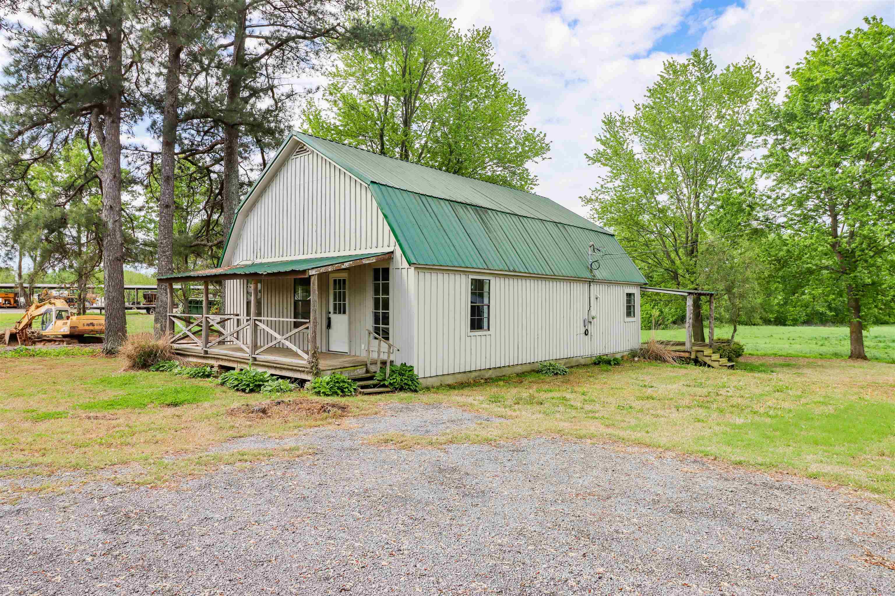 283 Forked Deer Road Ripley, TN 38063 - Photo 3 of 23 a view of a house with backyard and trees