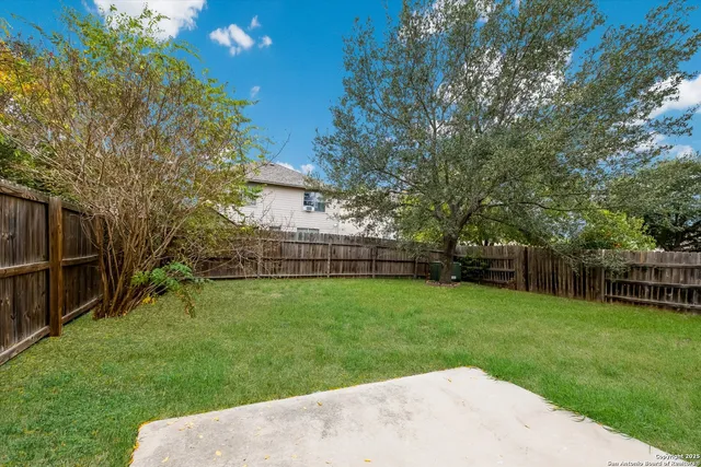 a view of a backyard with a garden