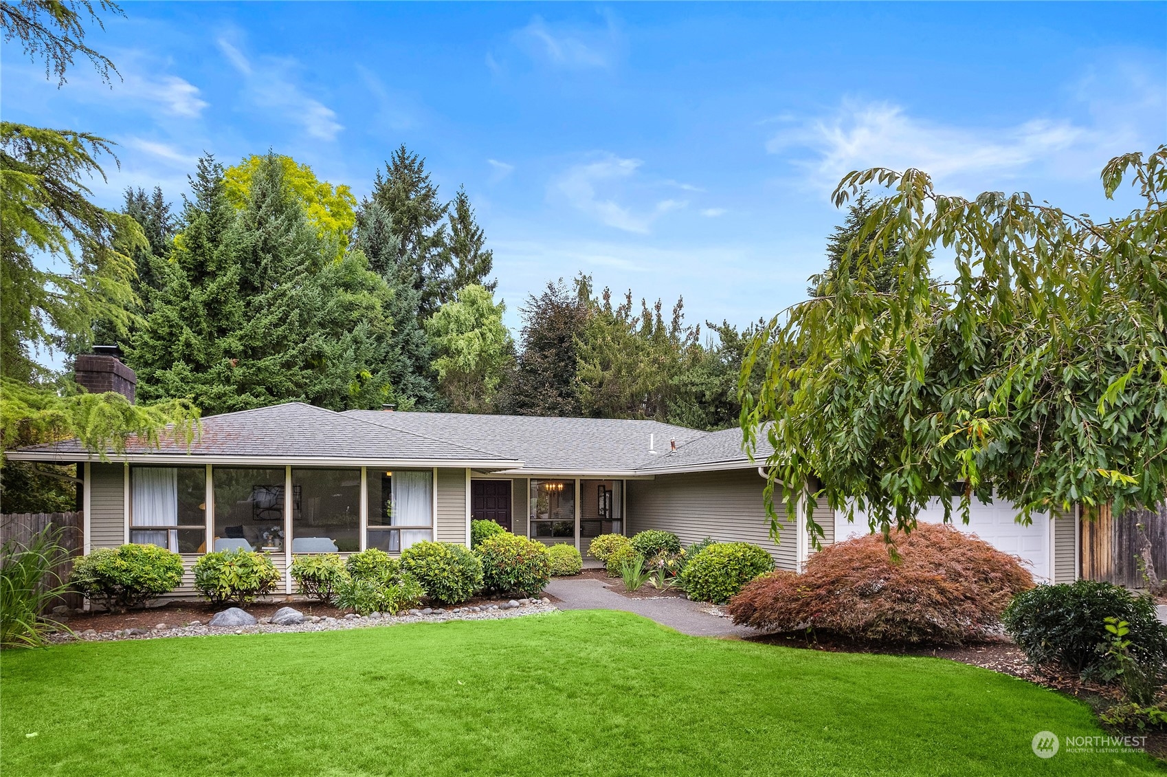 40 Chelan Key Bellevue, WA 98006 - Photo 1 of 29 a front view of a house with a yard and potted plants