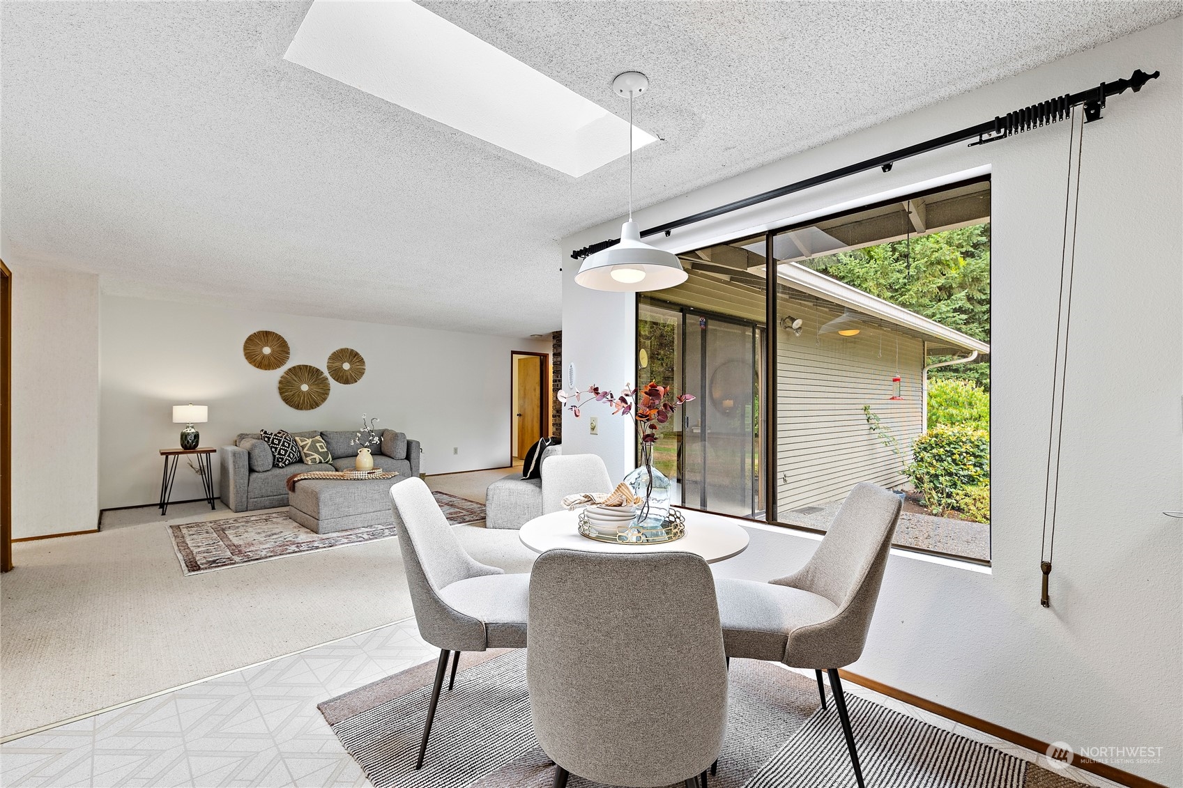 40 Chelan Key Bellevue, WA 98006 - Photo 12 of 29 a dining room with furniture and wooden floor