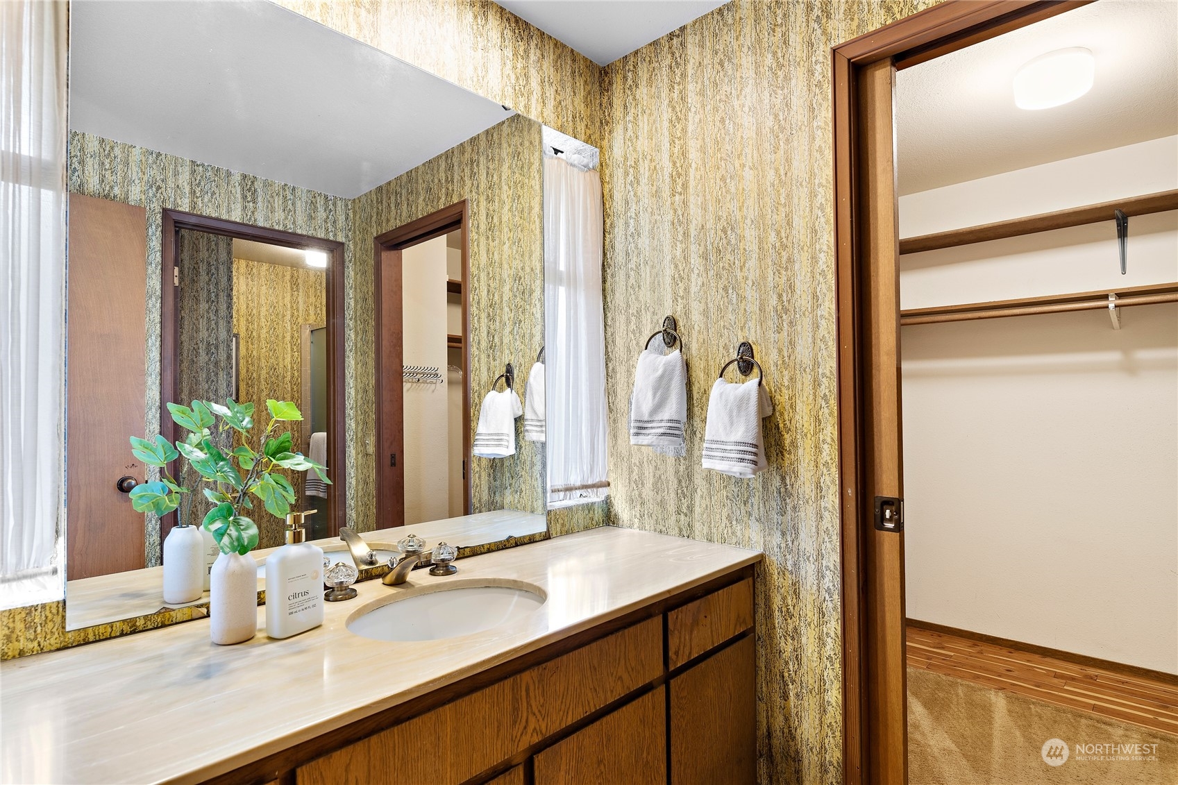 40 Chelan Key Bellevue, WA 98006 - Photo 20 of 29 a bathroom with a granite countertop sink and a mirror