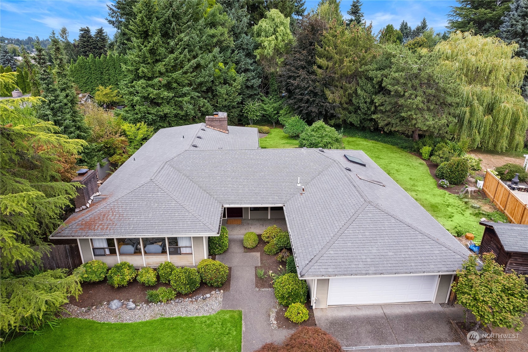 40 Chelan Key Bellevue, WA 98006 - Photo 2 of 29 an aerial view of a house with a yard table and chairs