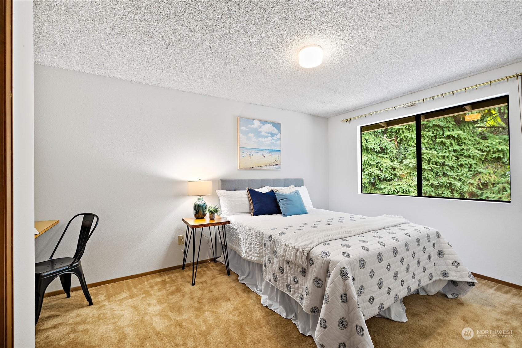 40 Chelan Key Bellevue, WA 98006 - Photo 22 of 29 a bedroom with a bed chair and window