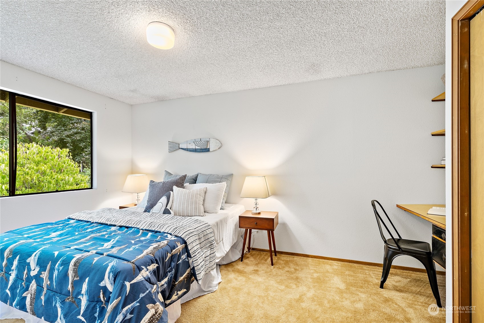 40 Chelan Key Bellevue, WA 98006 - Photo 23 of 29 a bedroom with a bed and a window