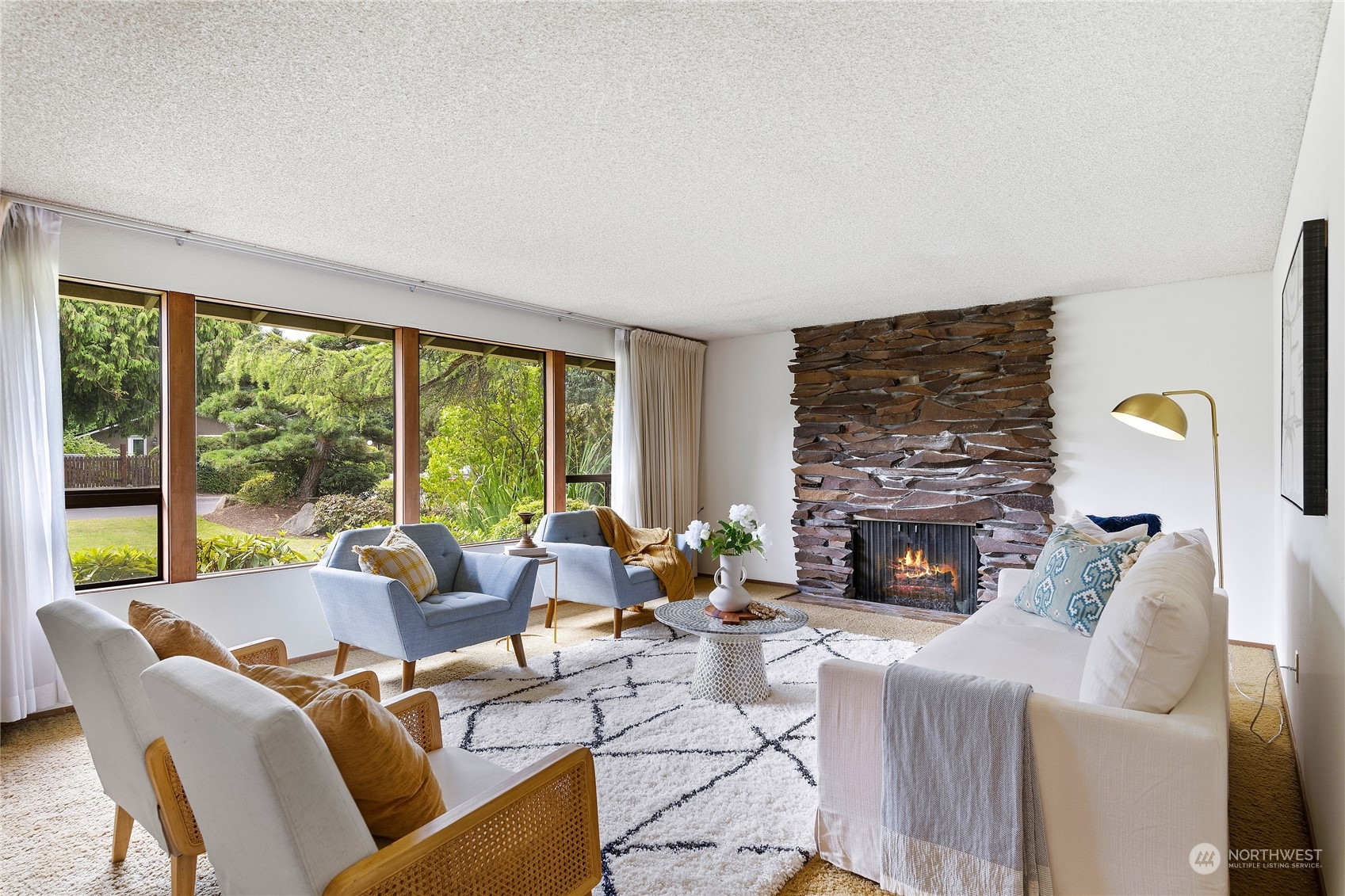 40 Chelan Key Bellevue, WA 98006 - Photo 6 of 29 a living room with furniture fireplace and a large window