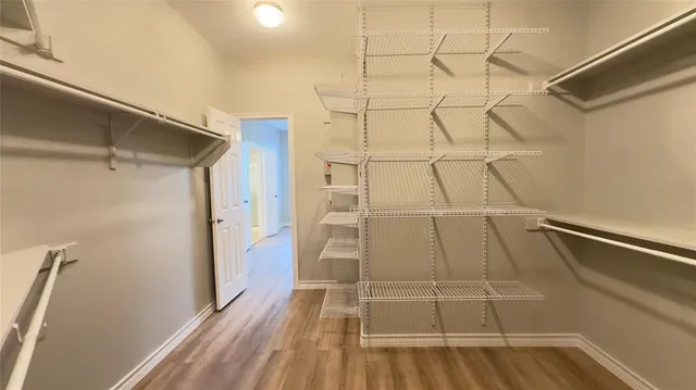 a bathroom with a sink double vanity and a mirror
