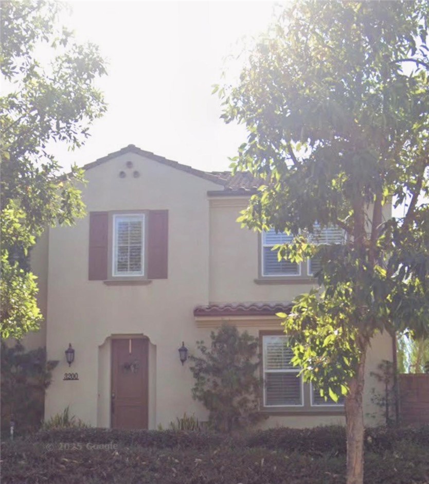 3200 East Santa Fe Road Brea, CA 92821 - Photo 1 of 1 a front view of a house with a yard