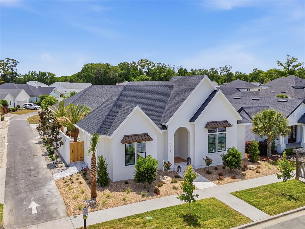 13125 Southwest 9th Road Newberry, FL 32669 - Photo 45 of 53 a front view of a house with garden