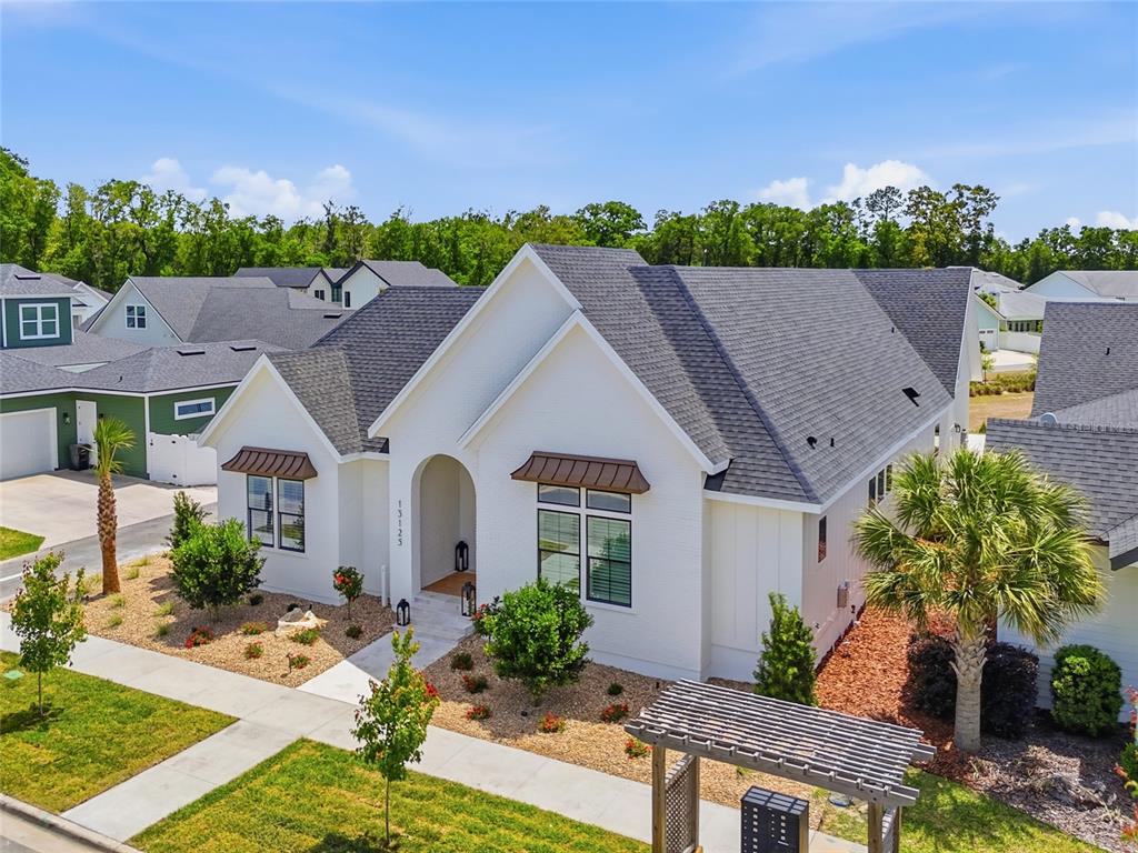 13125 Southwest 9th Road Newberry, FL 32669 - Photo 46 of 53 a aerial view of house with yard and green space