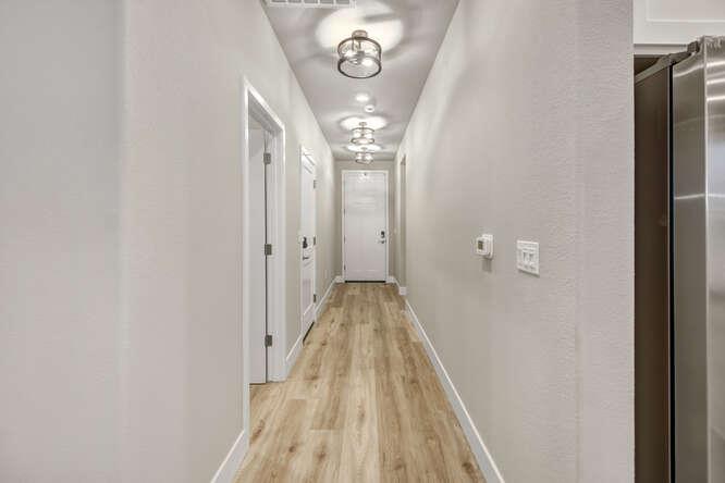 1480 Westwind Way Rocklin, CA 95765 - Photo 14 of 27 a view of a hallway with wooden floor