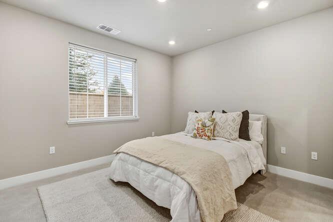 1480 Westwind Way Rocklin, CA 95765 - Photo 20 of 27 a bedroom with bed and a window