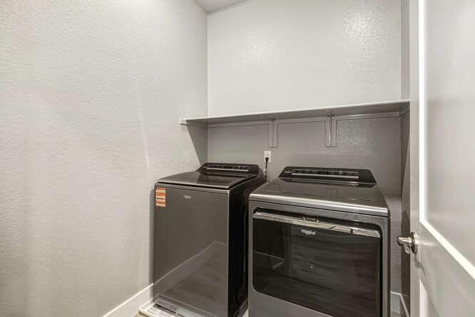 1480 Westwind Way Rocklin, CA 95765 - Photo 23 of 27 a close up view of a washer and dryer