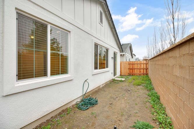 1480 Westwind Way Rocklin, CA 95765 - Photo 27 of 27 a view of a backyard with pathway