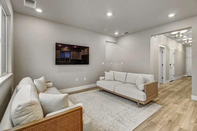 1480 Westwind Way Rocklin, CA 95765 - Photo 8 of 27 a living room with furniture and a flat screen tv