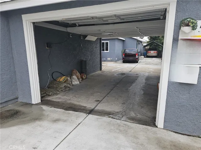 a view of a livingroom with car parked