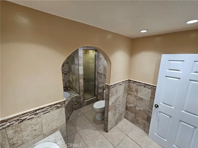 a bathroom with a sink and toilet
