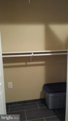 a bathroom with a shower and a sink